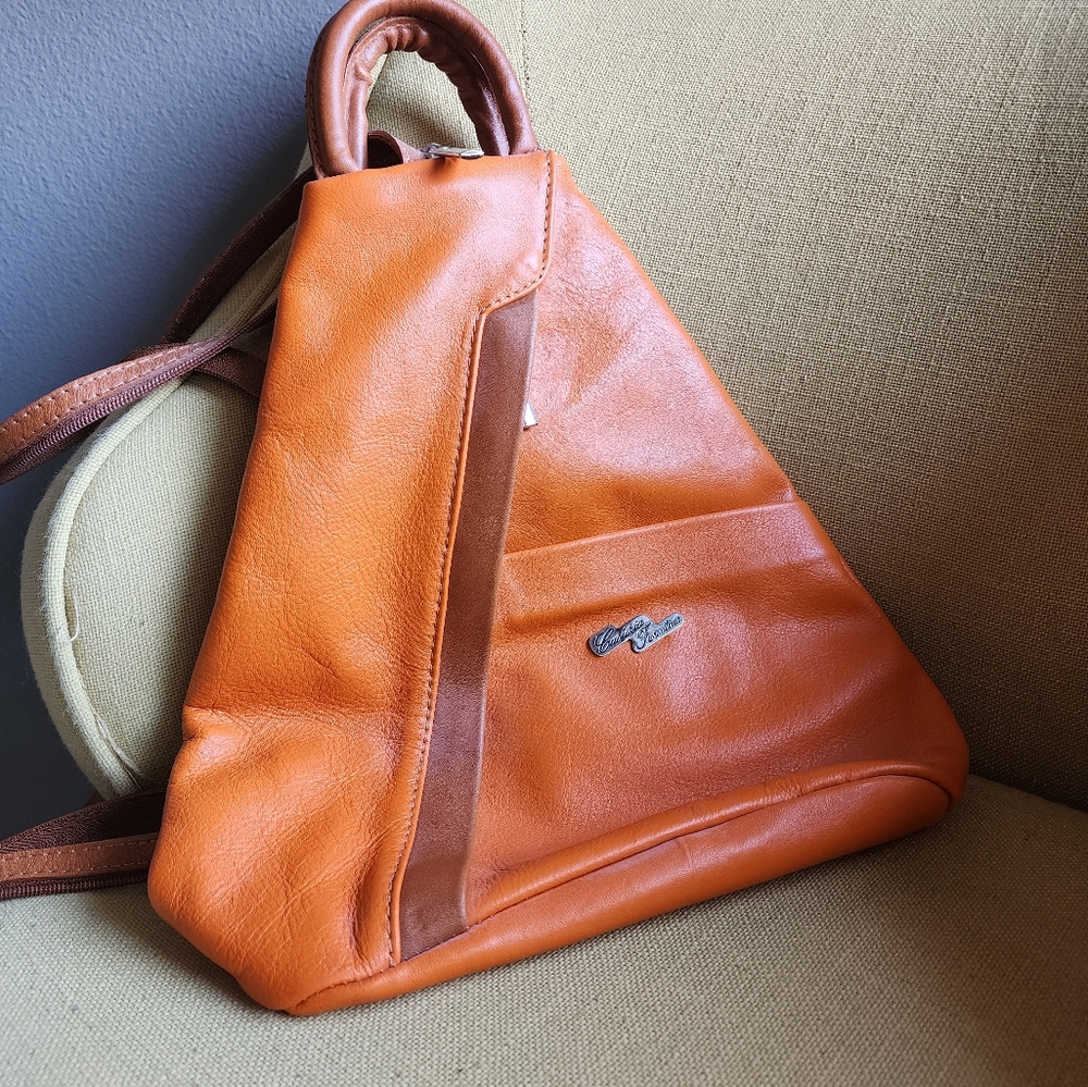 Cuoieria Fiorentina convertible backpack purse in orange leather made in Italy.